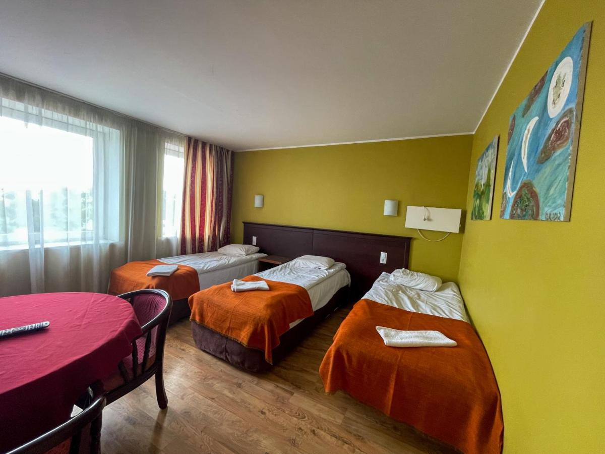 Taurage Hotel Bagian luar foto